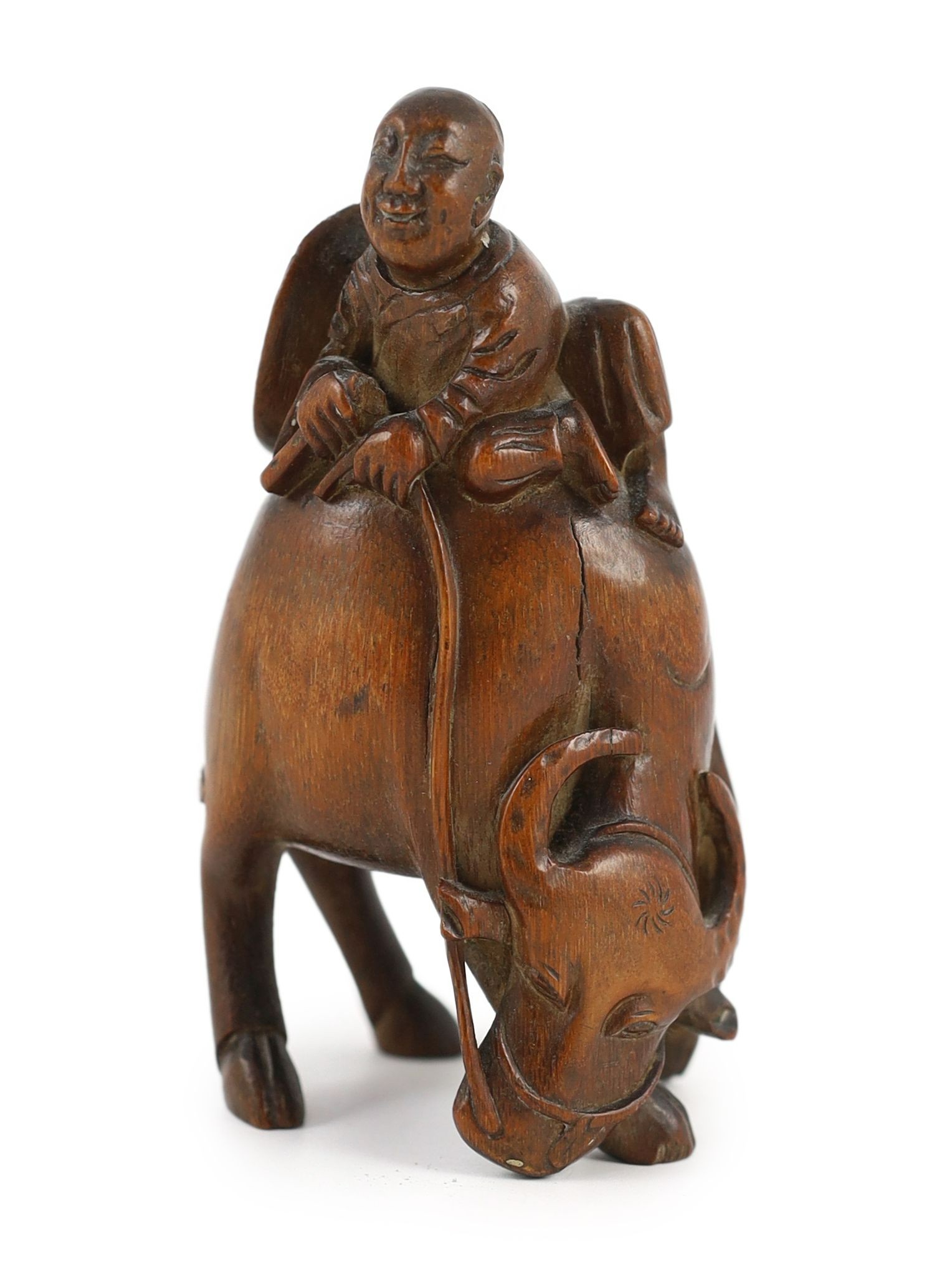 A Chinese bamboo group of boy riding a buffalo, 18th/19th century, 12.5 cm high